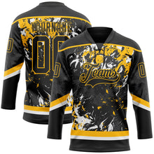 Laden Sie das Bild in den Galerie-Viewer, Uksn Individuelles Schwarz Gold-Weiß 3D-Fluid-Art-Splash Eishockey-Trikot mit Schnürkragen