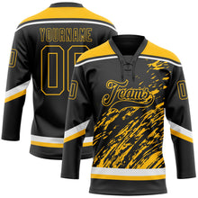 Laden Sie das Bild in den Galerie-Viewer, Uksn Individuelles Schwarz Gold-Weiß 3D-Splash-Art Eishockey-Trikot mit Schnürkragen