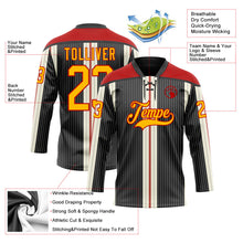 Laden Sie das Bild in den Galerie-Viewer, Uksn Individuelles Schwarz Gold Creme-Rot 3D-Muster Design-Streifen Eishockey-Trikot mit Schnürkragen