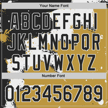 Laden Sie das Bild in den Galerie-Viewer, Uksn Individuelles Bomberjacke in Schwarz-Weiß-Altgold mit Design im Torn-Paper-Stil und Farbspritzern, Druckknopfleiste, Kapuze und Varsity-Letterman-Stil