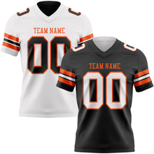 Laden Sie das Bild in den Galerie-Viewer, Uksn Individuelles Schwarz Weiß-Orange Wendbares Zweiseitiges Authentisches Football Trikot