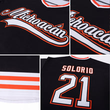 Laden Sie das Bild in den Galerie-Viewer, Uksn Individuelles Schwarz Weiß-Orange Eishockey-Trikot