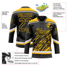 Laden Sie das Bild in den Galerie-Viewer, Uksn Individuelles Schwarz Gold-Weiß 3D-Splash-Art Eishockey-Trikot mit Schnürkragen
