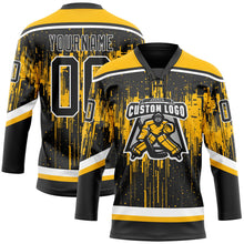 Laden Sie das Bild in den Galerie-Viewer, Uksn Individuelles Schwarz Gold Stahlgrau-Weiß 3D-Muster tropfende Farbkleckse Eishockey-Trikot mit Schnürkragen
