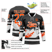 Laden Sie das Bild in den Galerie-Viewer, Uksn Individuelles Schwarz Orange-Weiß 3D-Muster abstrakte Farbkleckse Eishockey-Trikot mit Schnürkragen
