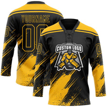 Laden Sie das Bild in den Galerie-Viewer, Uksn Individuelles Schwarz-Gold Diagonale Kratz-Pinselstriche Farbkleckse Eishockey-Trikot mit Schnürkragen
