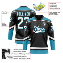 Laden Sie das Bild in den Galerie-Viewer, Uksn Individuelles Schwarz Weiß-Pantherblau Eishockey-Trikot mit Schnürkragen
