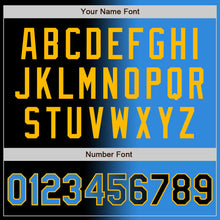 Laden Sie das Bild in den Galerie-Viewer, Uksn Individuelles Bomberjacke in Schwarz-Puderblau-Gold mit Farbverlauf-Design, Druckknopfleiste und Varsity-Letterman-Stil

