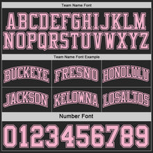 Laden Sie das Bild in den Galerie-Viewer, Uksn Individuelles Schwarz-Hellrosa Seitenpanel Geometrisch Chevron Wendbar Doppelseitig Sublimation Basketball-Set Trikot
