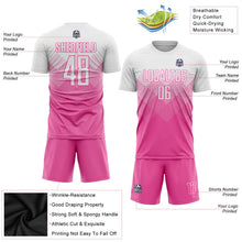 Laden Sie das Bild in den Galerie-Viewer, Uksn Individuelles Pink Weiß Sublimations-Fußballtrikot
