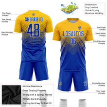 Laden Sie das Bild in den Galerie-Viewer, Uksn Individuelles Gold Royalblau-Weiß Sublimations-Fußballtrikot
