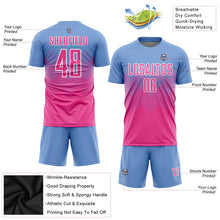 Laden Sie das Bild in den Galerie-Viewer, Uksn Individuelles Hellblau Pink-Weiß Sublimations-Fußballtrikot
