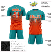 Laden Sie das Bild in den Galerie-Viewer, Uksn Individuelles Petrol Orange-Weiß Sublimations-Fußballtrikot
