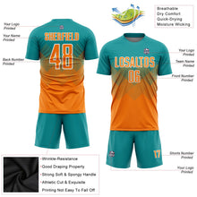 Laden Sie das Bild in den Galerie-Viewer, Uksn Individuelles Petrol Bay Orange-Weiß Sublimations-Fußballtrikot
